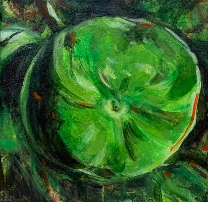 A bright green pumpkin seen from above among dark vines, flecked with small strokes of orange.