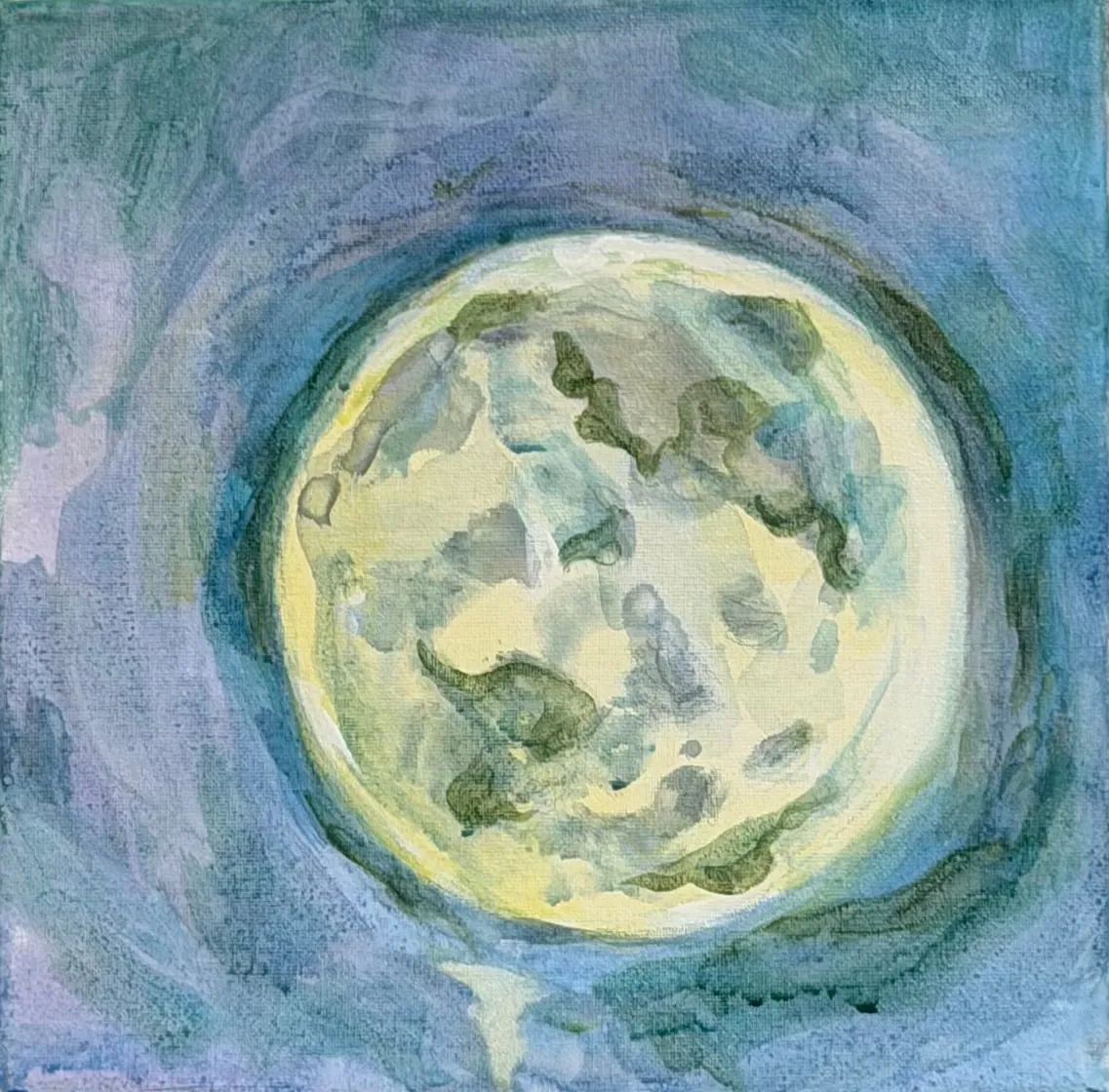 A pale yellow full moon, its surface mottled grey-green, inside a ring of blue and violet washes.
